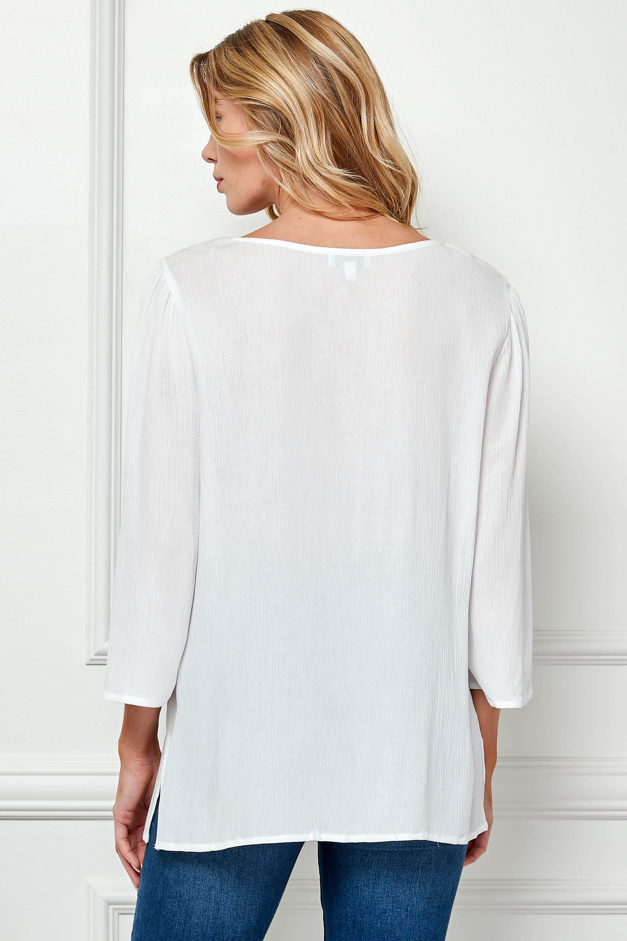 Roz and Ali 3/4 Flare Sleeve Embroidered Yoke Tunic in White - Image 4
